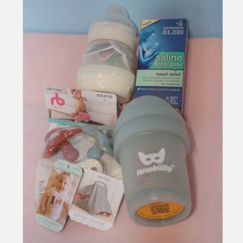Baby Welcome Kit: Bottles, saline drops, pacifiers, gift cards, value $199